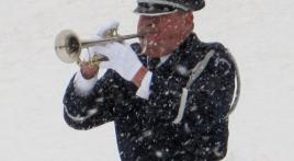 Military bugler performs at 10,000th service