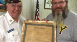 Original charter is returned to Bentonvile, Ark., Post 77